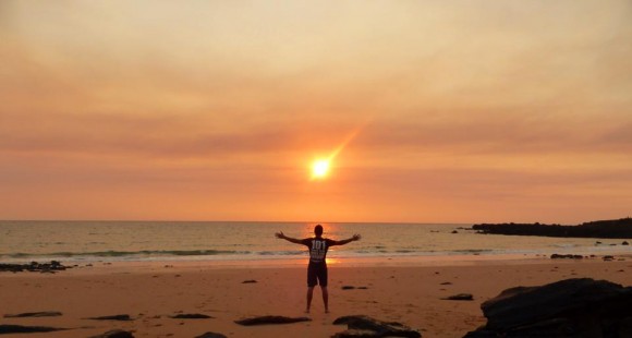 Greig stood on the Kimberly coast at sunset