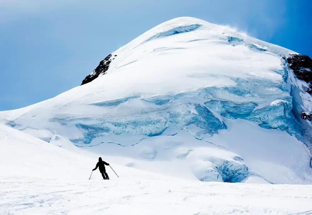 A man skiing in the Italian Alpes