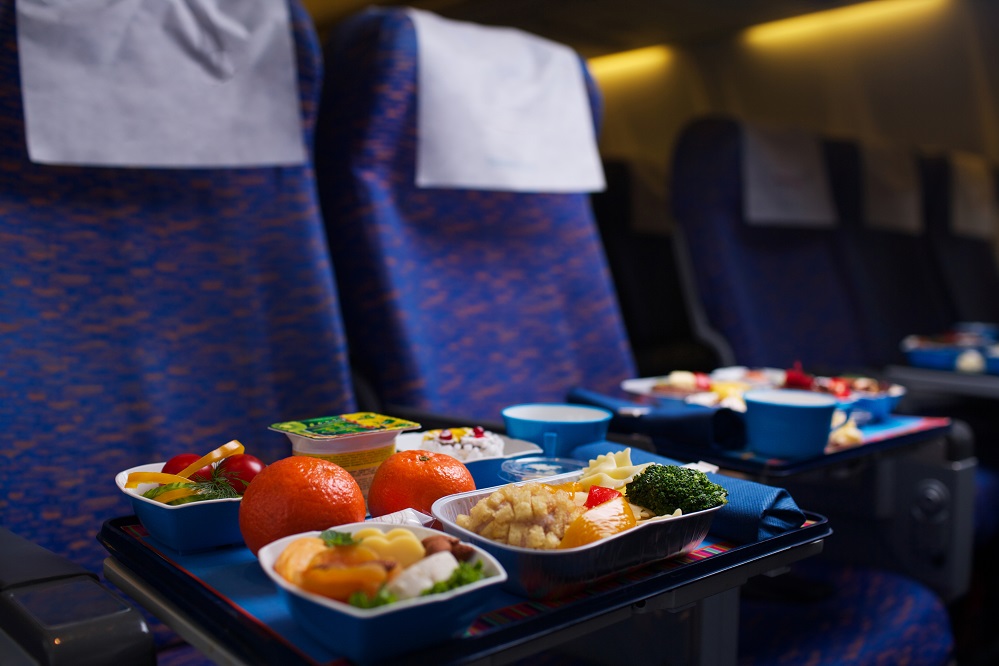 Tray of food on the plane, business class travel