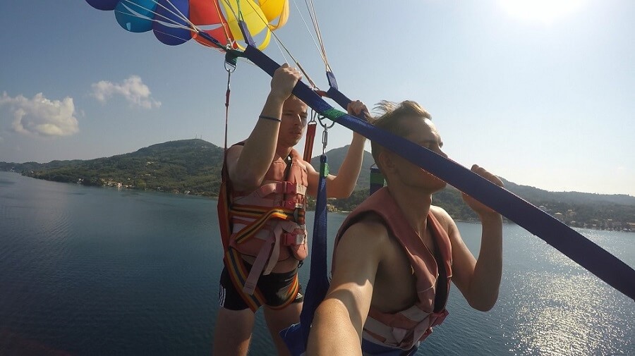 Two people parasailing