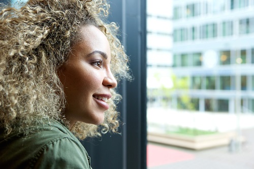 A woman looking out the window