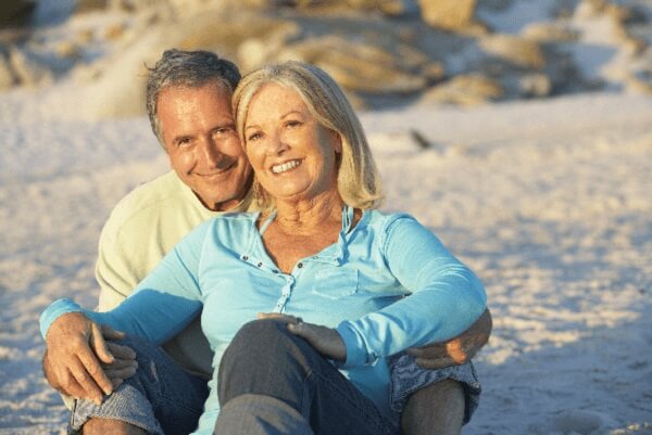 A couple sat on the beach