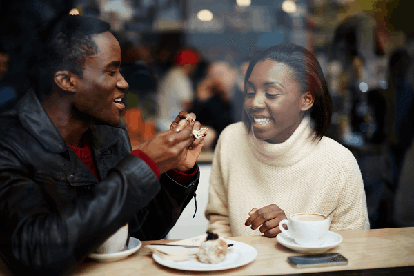 A couple eating in a café