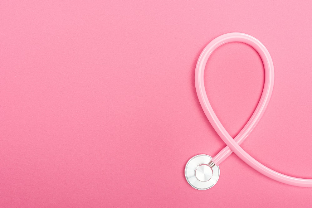 Stethoscope on pink background