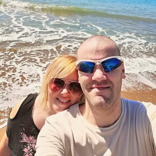couple smiling at beach