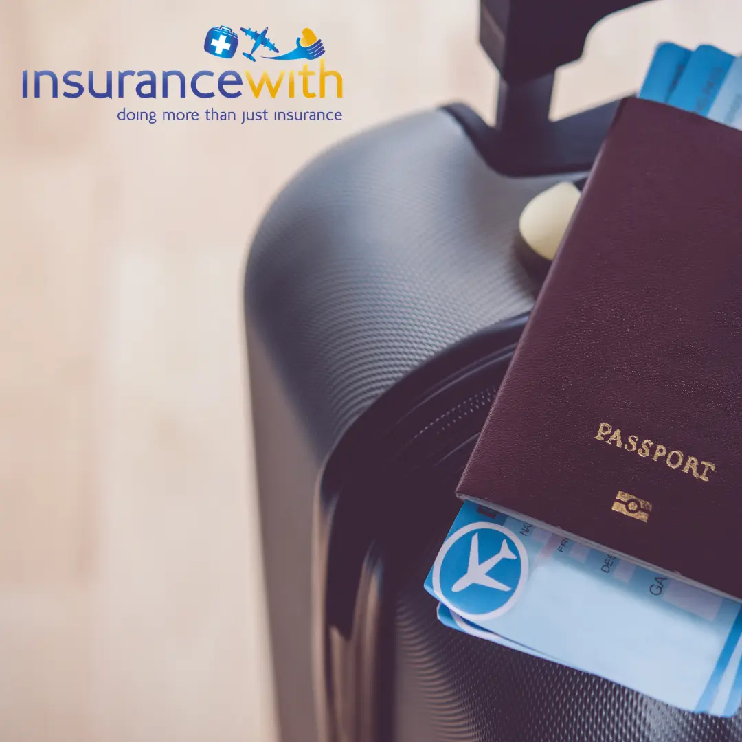 Close-up photo of suitcase with passport and flight ticket on top.